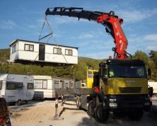 фото услуга перевозки бытовок манипулятором