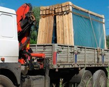 фото услуга перевозки стекла манипулятором